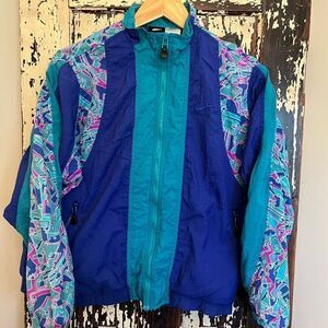 Women’s vintage 90’s Nike nylon jacket. Size Small.